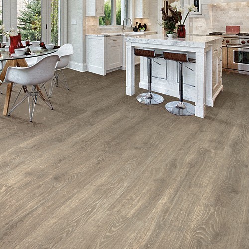 Laminate flooring in kitchen | Lowell Carpet & Coverings
