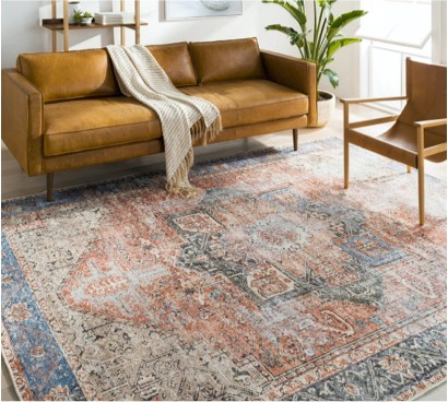 Area rug in living room | Lowell Carpet & Coverings